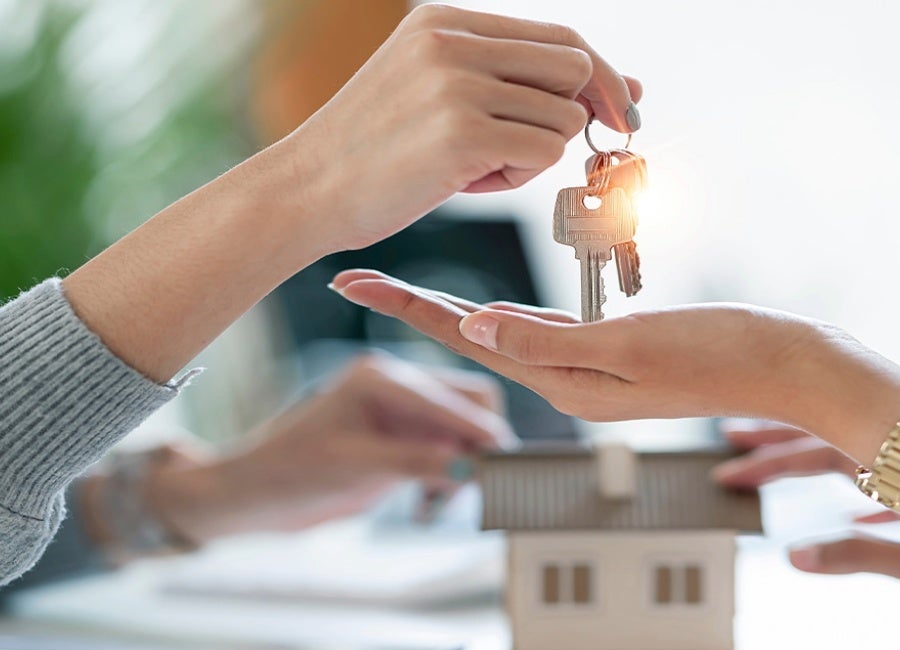 Person handing keys